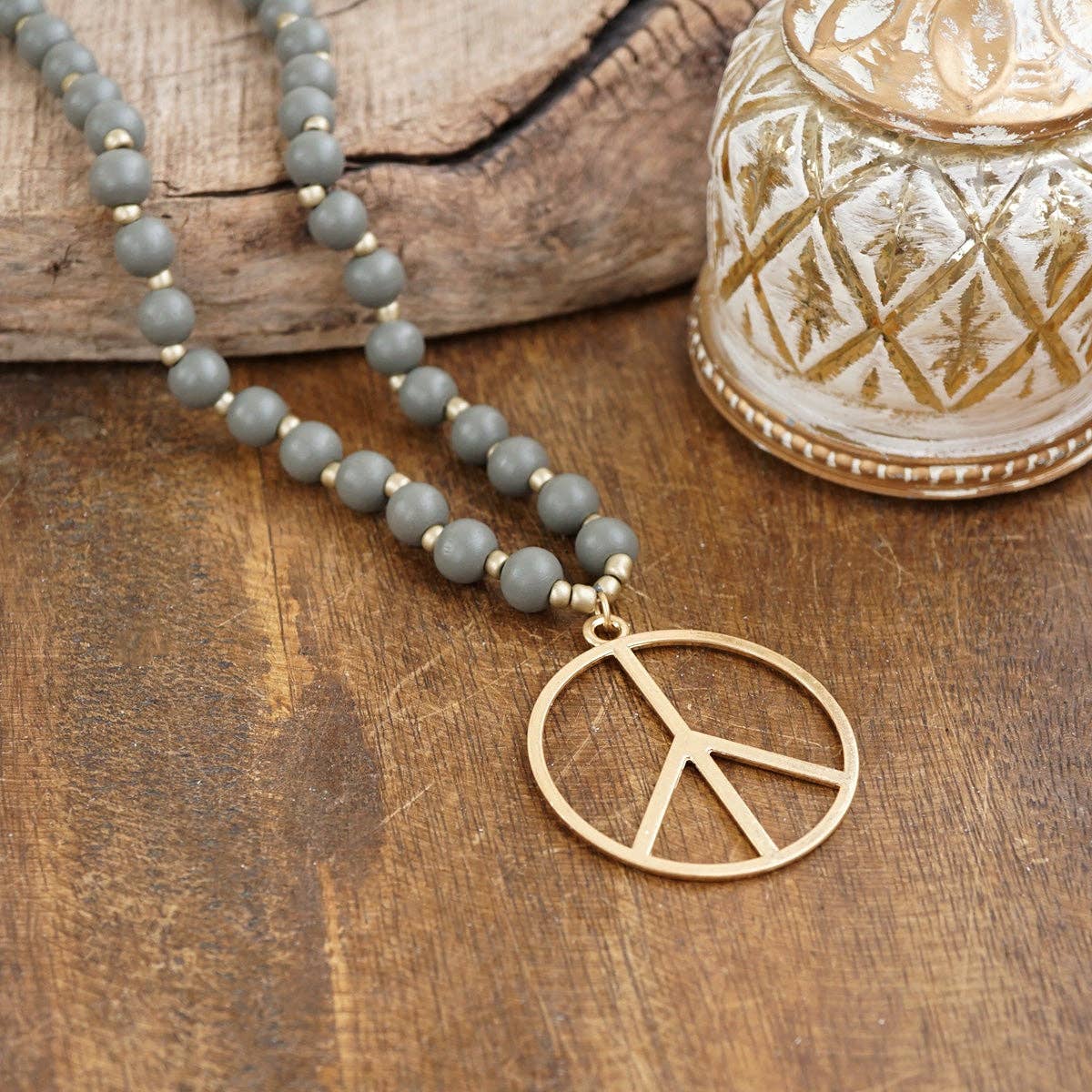 Long Wood Bead Necklace with golden peace sign pendant - Gray