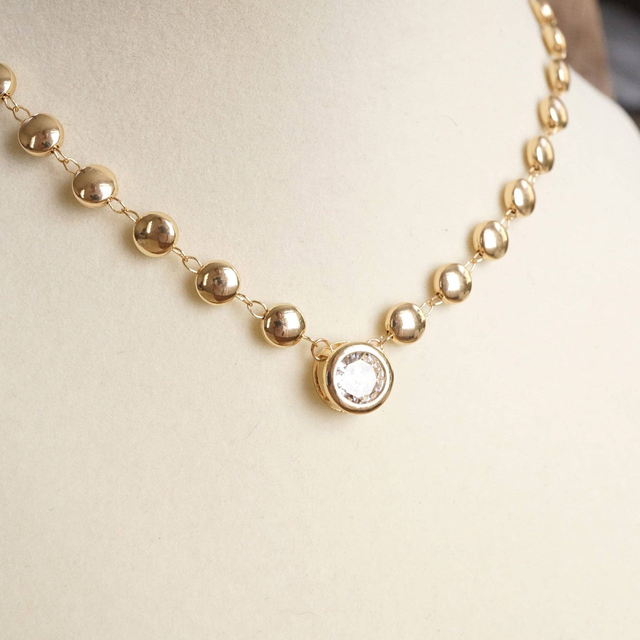 Clear Crystal Bezel Pendant Dot Chain Neckline Necklace: Gold Tone